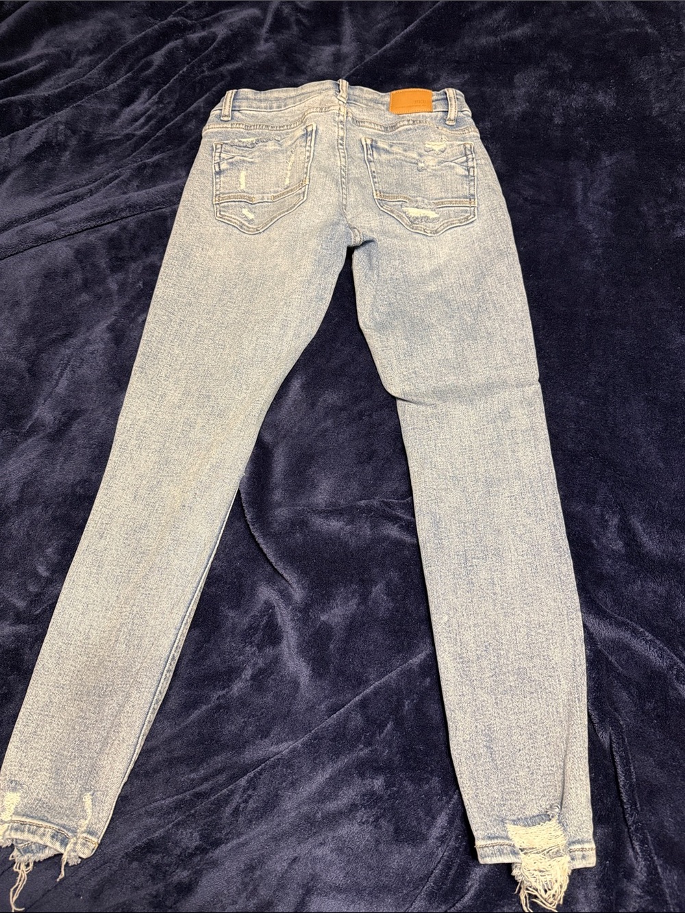 BKE Light Blue Women’s Skinny Jeans with Frayed Ankles